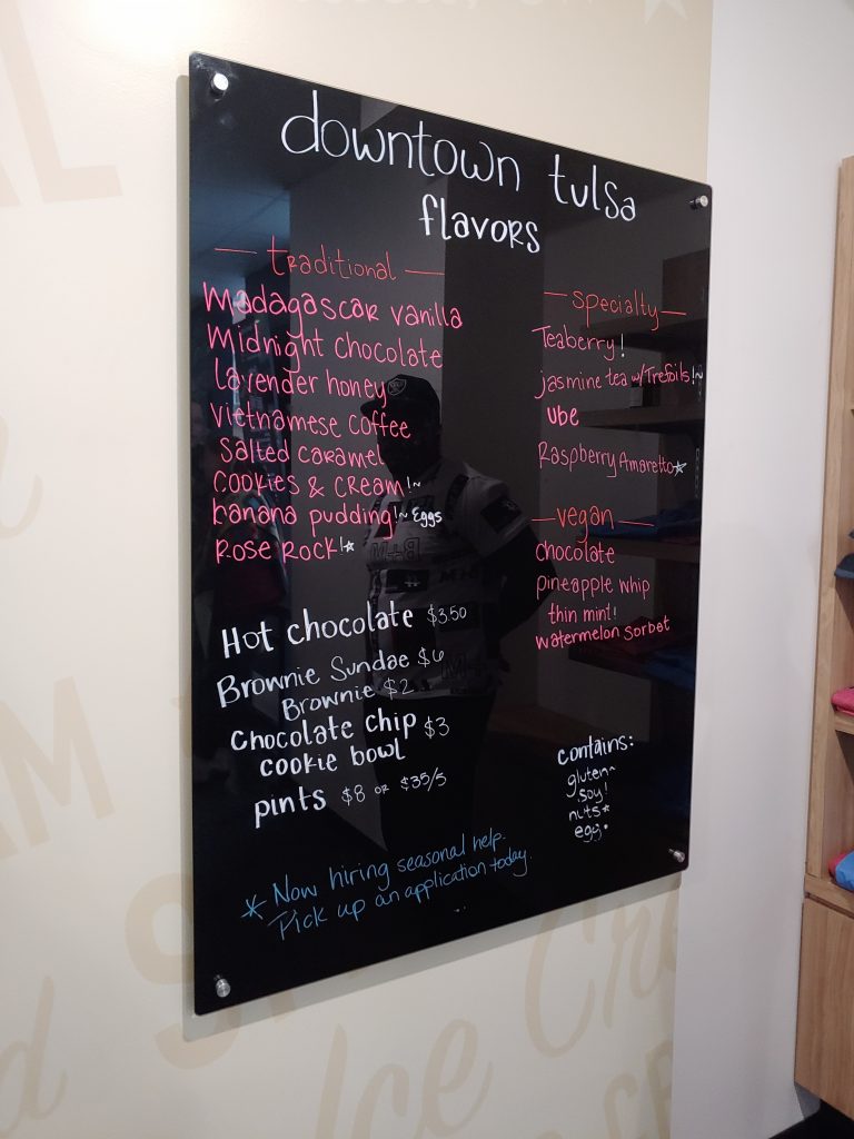 The flavors of the day listed at accessible ice cream shop, Rose Rock Microcreamery in Tulsa.