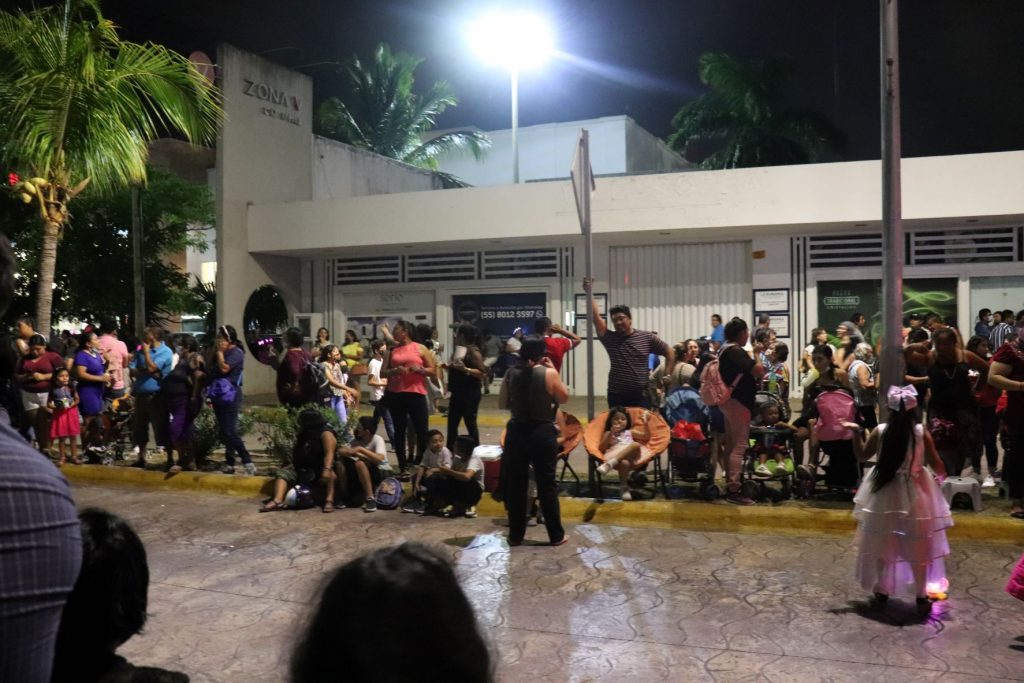 Lots of people lining the street, getting ready for the accessible parades during Cozumel's Carnaval celebration!