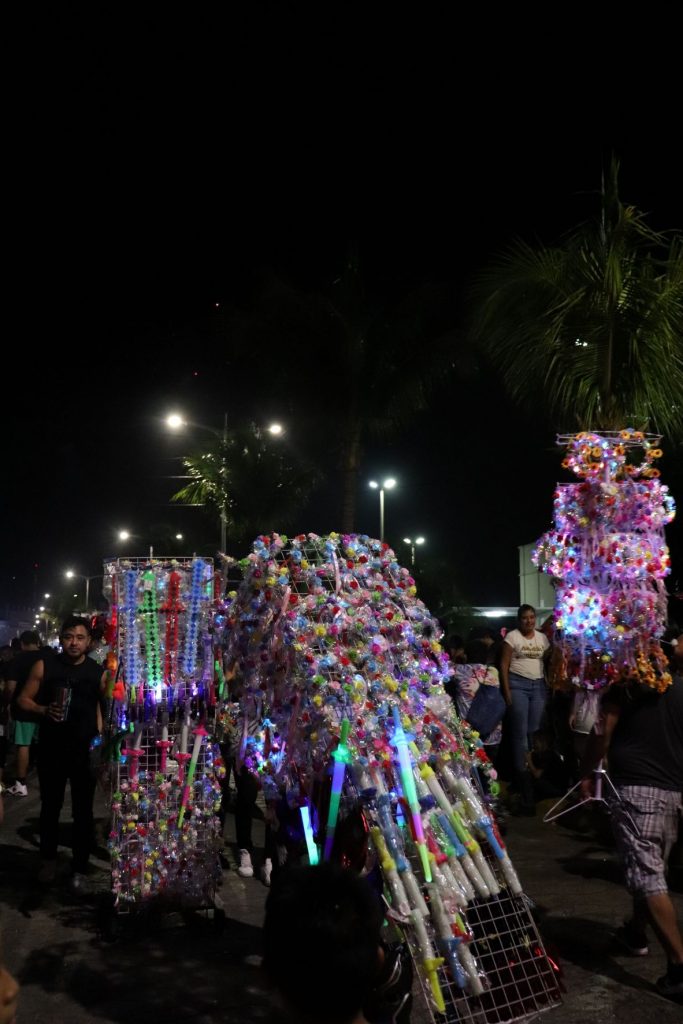 Vendors in the streets selling candy, food, and toys during Cozumel's Carnaval celebration!
