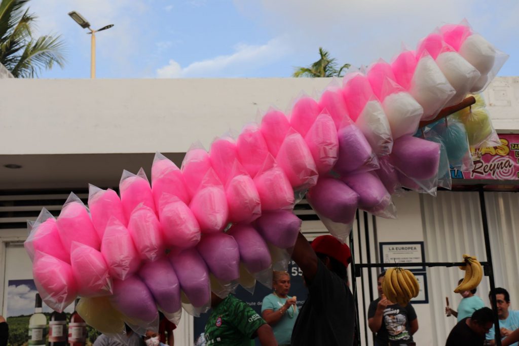 Vendors in the streets selling candy, food, and toys during Cozumel's Carnaval celebration!