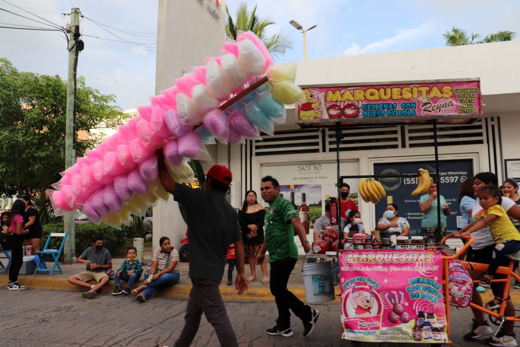 Vendors in the streets selling candy, food, and toys during Cozumel's Carnaval celebration!