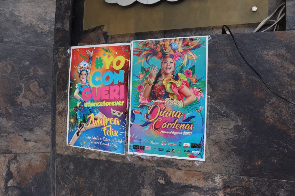 Two promotional posters in bright colors featuring two queen candidates for Carnaval in Cozumel Mexico. They are designed to encourage votes for these candidates to be crowned queen.